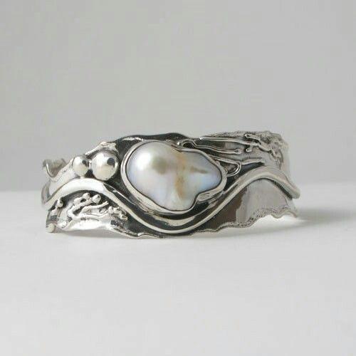Bague ondulée vintage en argent avec pierre blanche