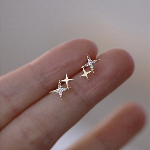 Boucles d'oreilles clous étoiles avec zircons dorés