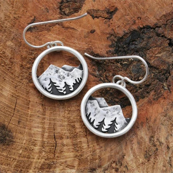 Boucles d'oreilles bohèmes argentées avec motif montagne