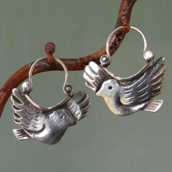 Boucles d'oreilles pendantes d'inspiration bohème – Ton argenté