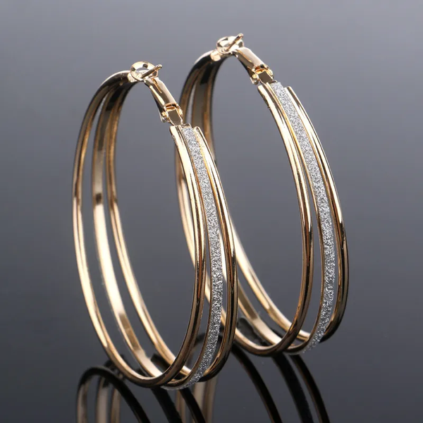 Boucles d'oreilles créoles lumineuses vintage