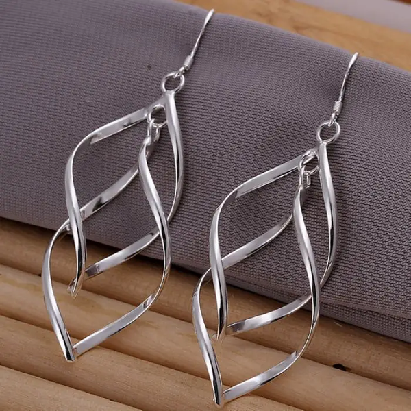 Boucles d'oreilles pendantes vintage en argent creux