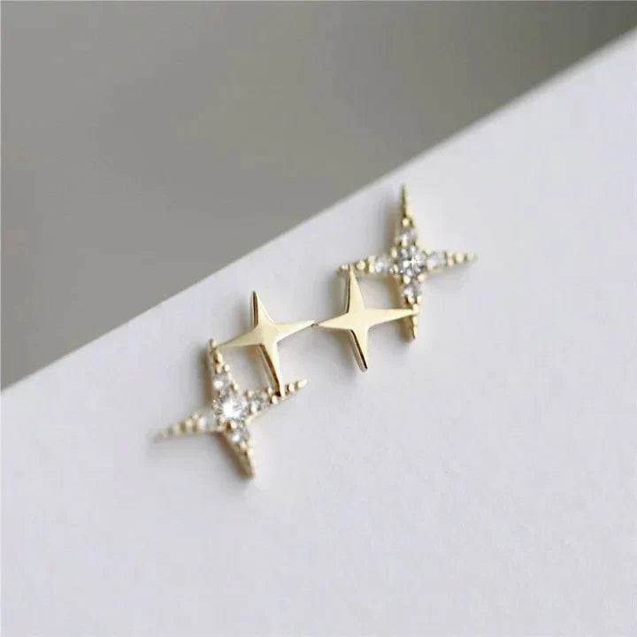 Boucles d'oreilles clous étoiles avec zircons dorés